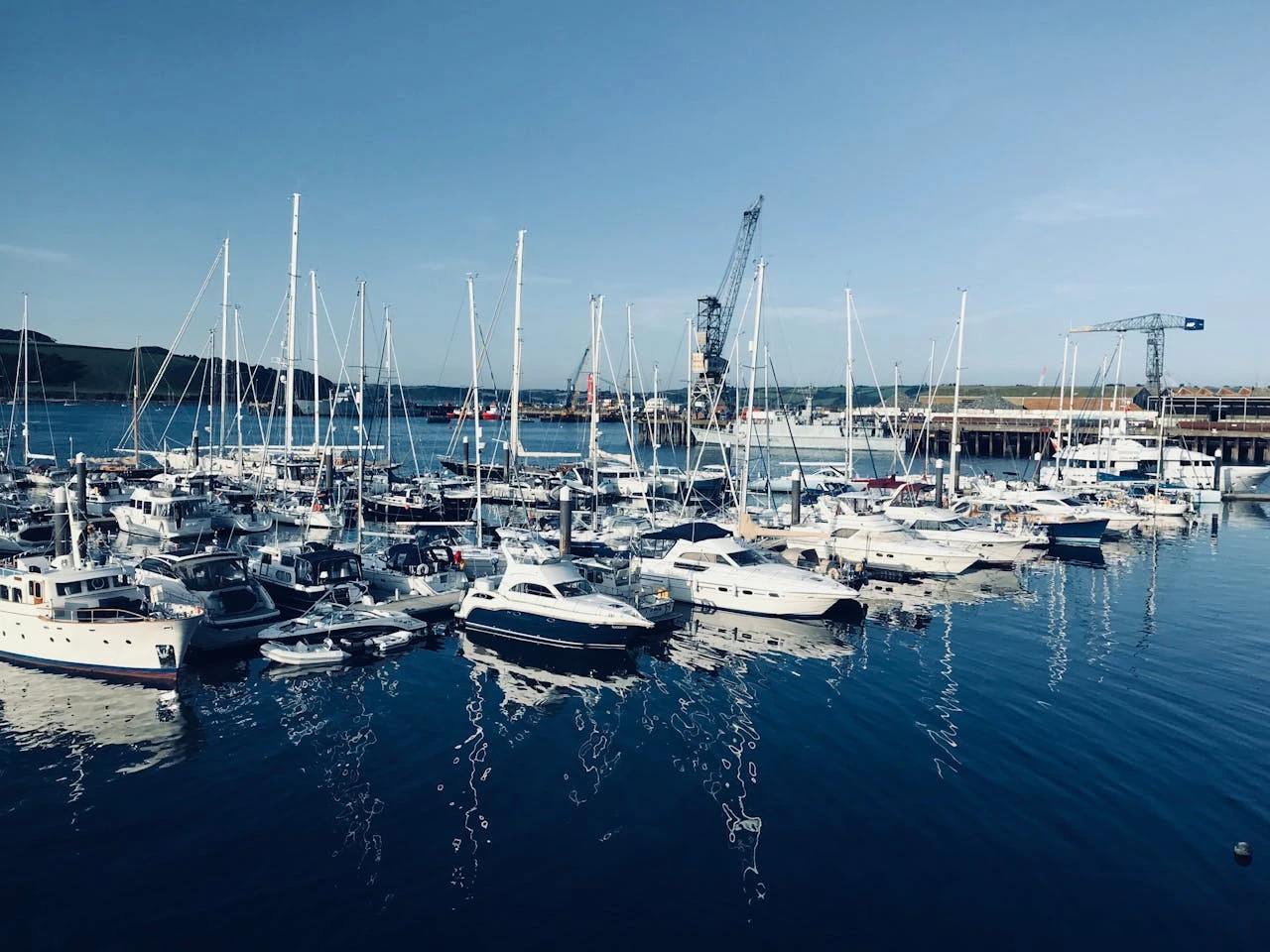 The yacht is docked at the marina