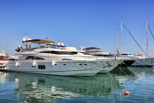 The yacht is docked at the marina
