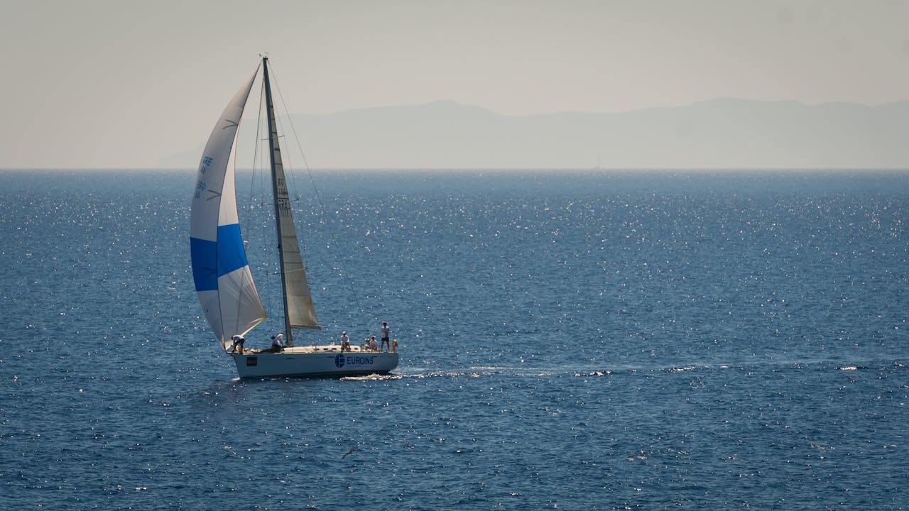 Sailboat travelling on the sea